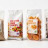 Comparison of common plastic packaging bag materials: LDPE, BOPP, PET, and Nylon showing different transparency and texture