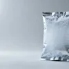 Concept visual of a frozen food packaging pouch in a cold-chain setting with frost on the film