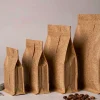 Five kraft stand-up pouches of graduated sizes lined up beside a digital caliper and a tape measure on a studio table